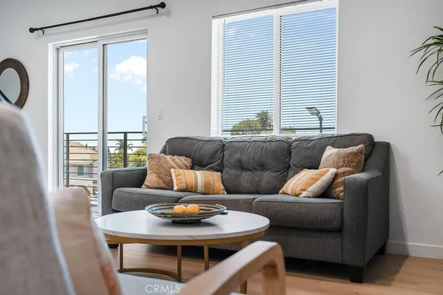 a view of a backyard with sitting area