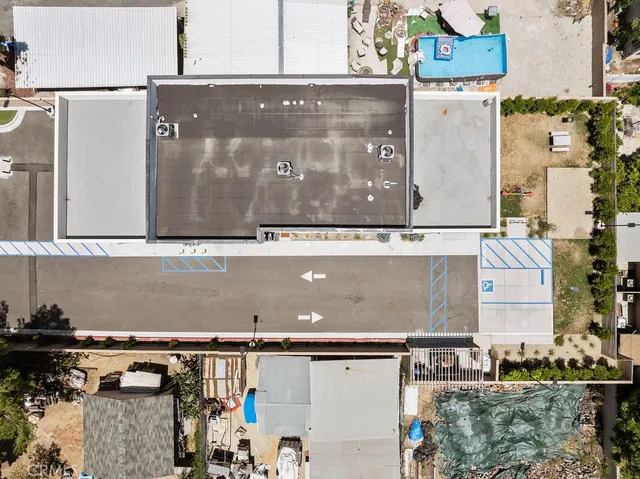 an aerial view of residential house and outdoor space