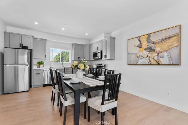 a kitchen with a sink stove and microwave