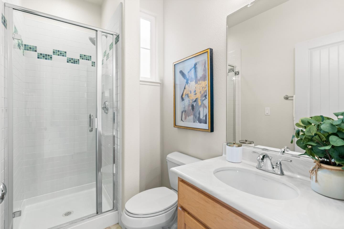 221 Bayberry Circle Pacifica, CA 94044 - Photo 27 of 63 a bathroom with a sink a toilet and shower