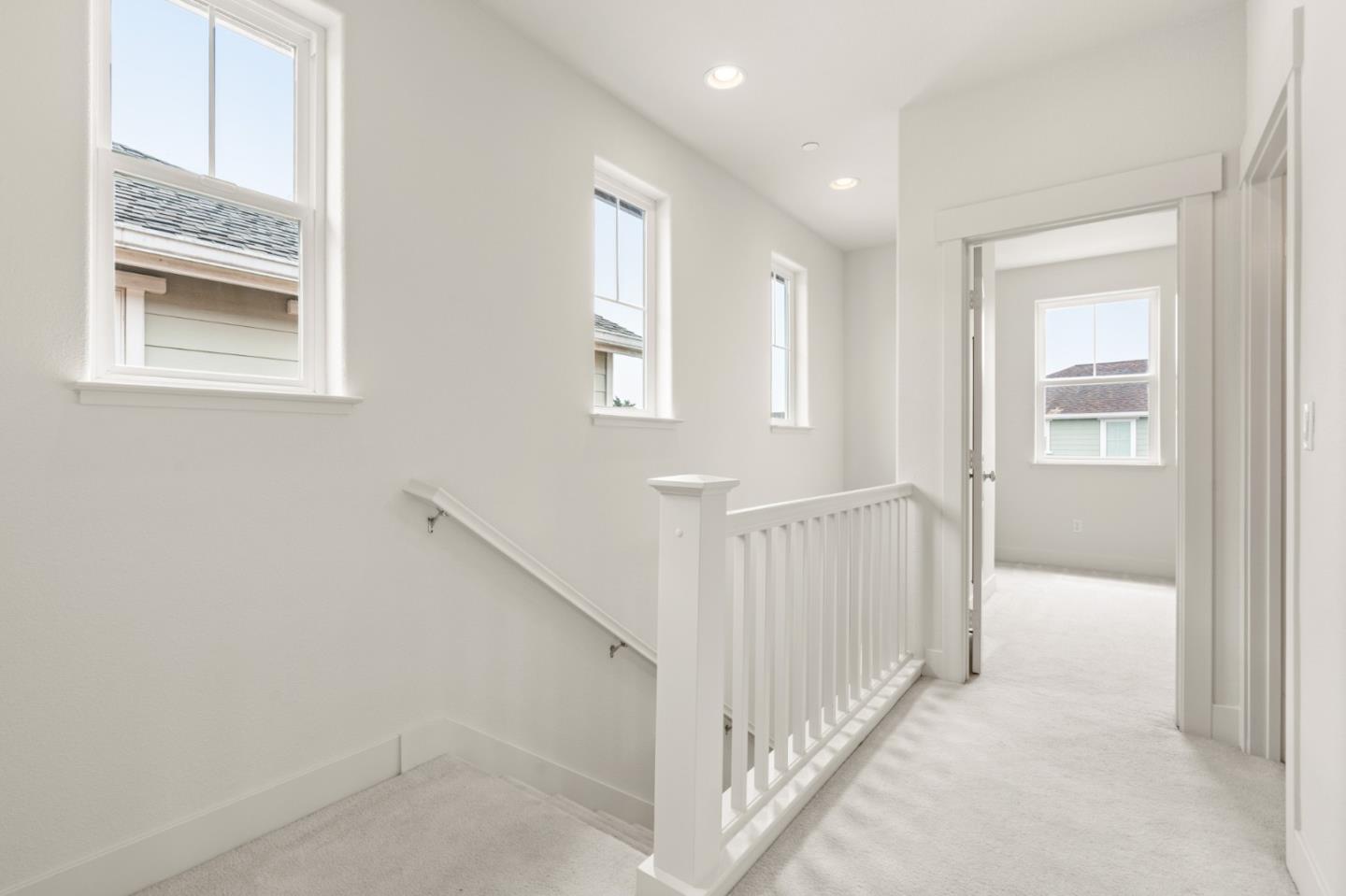 221 Bayberry Circle Pacifica, CA 94044 - Photo 28 of 63 a view of an entryway with wooden floor