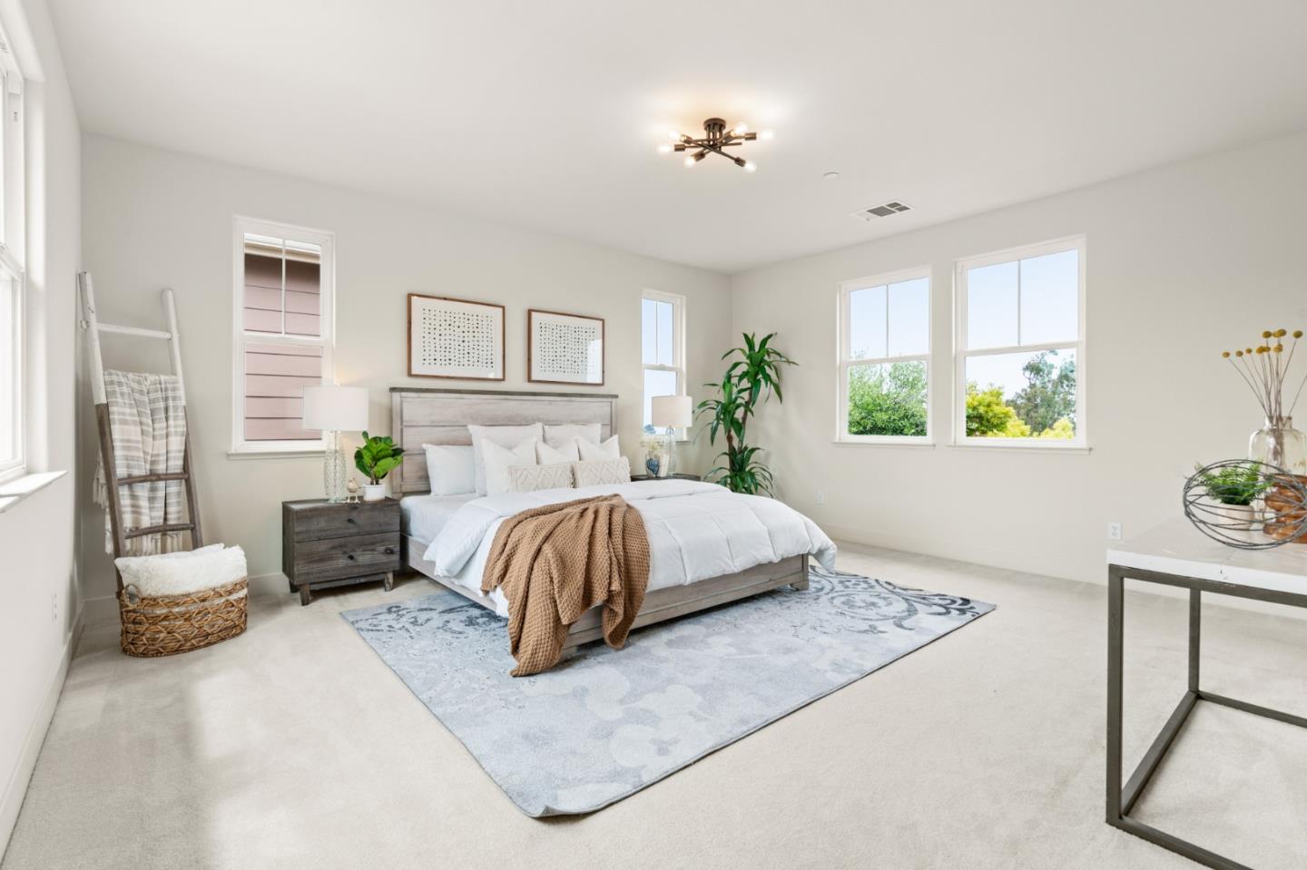 221 Bayberry Circle Pacifica, CA 94044 - Photo 29 of 63 a bedroom with a large bed and windows