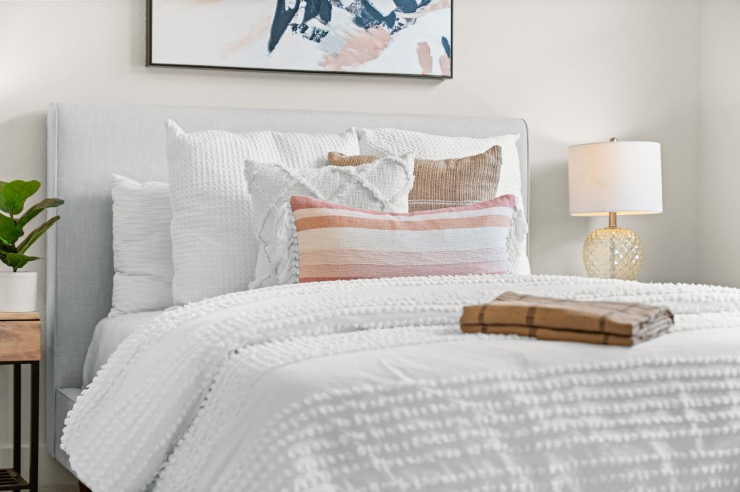 221 Bayberry Circle Pacifica, CA 94044 - Photo 48 of 63 a bedroom with a bed and a painting on the wall