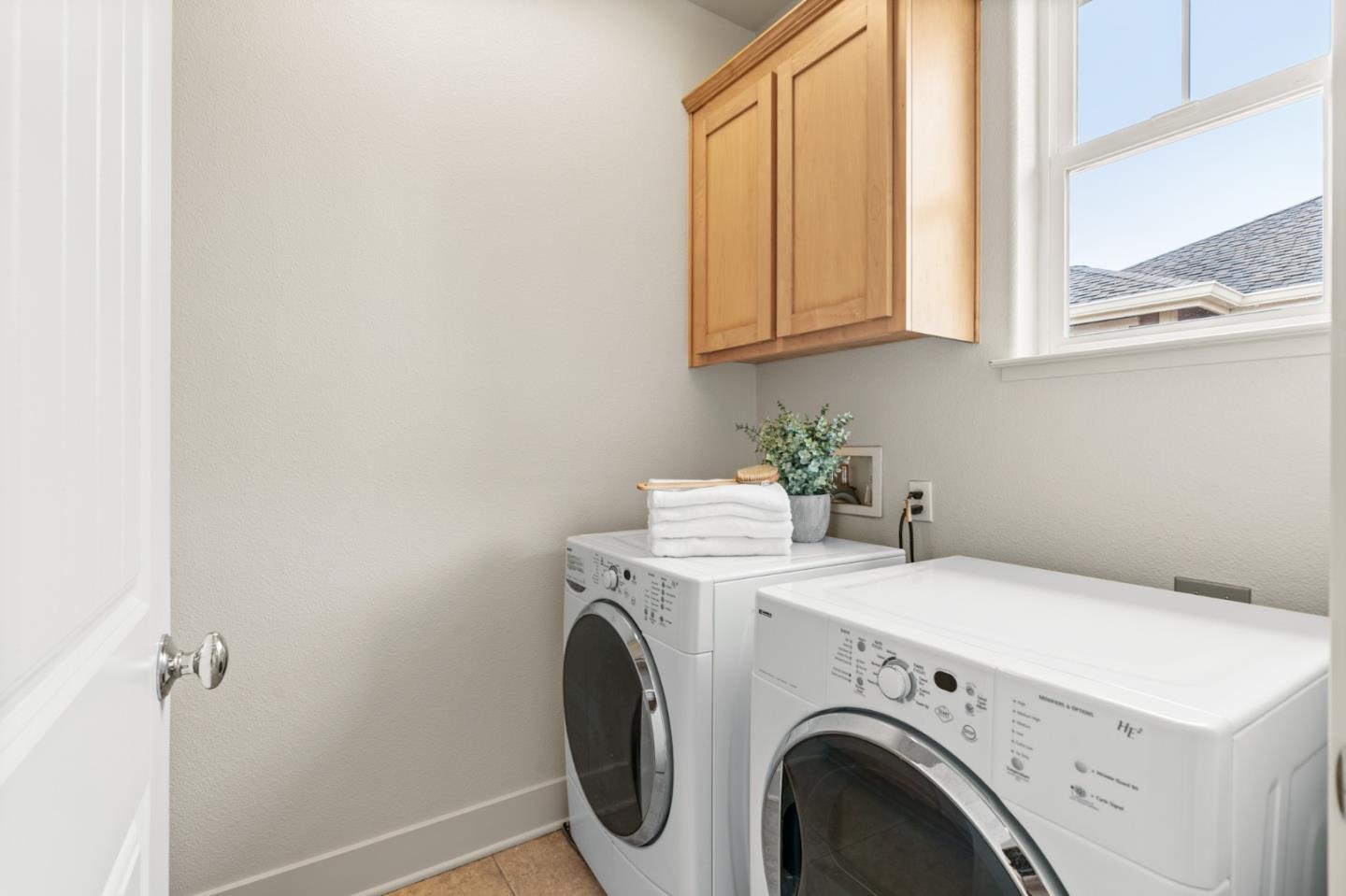 221 Bayberry Circle Pacifica, CA 94044 - Photo 51 of 63 a utility room with dryer and washer