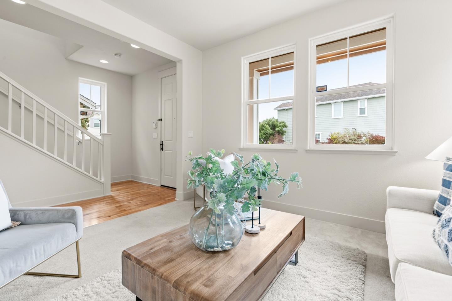 221 Bayberry Circle Pacifica, CA 94044 - Photo 6 of 63 a dining room with furniture and wooden floor