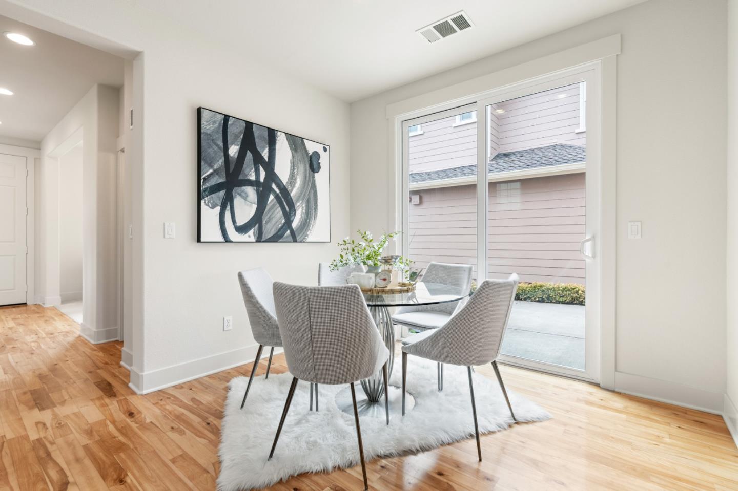 221 Bayberry Circle Pacifica, CA 94044 - Photo 9 of 63 a view of a livingroom with furniture and wooden floor