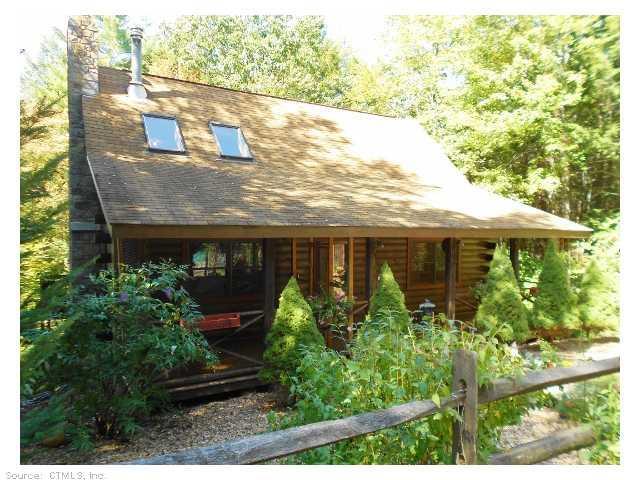 441 Riverton Road Hartland, CT 06065 - Photo 1 of 1 a view of a house with garden