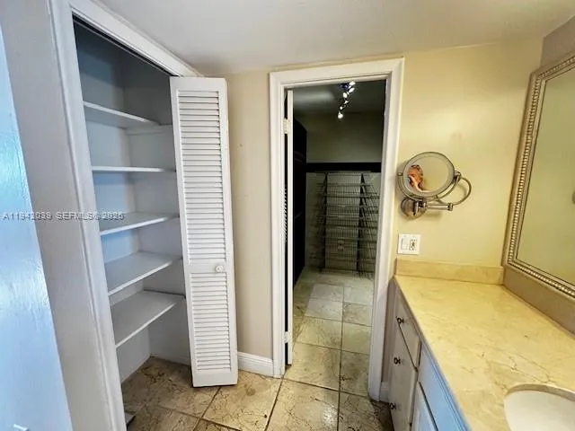 a bathroom with a tub and a shower