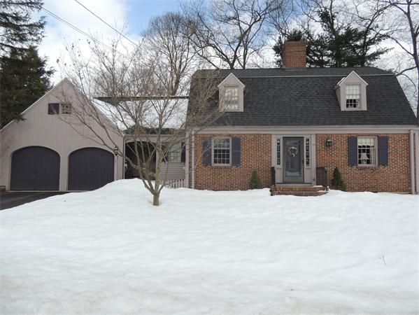 a view of a house with snow yard