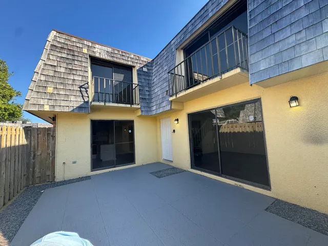 a view of a house with a garage