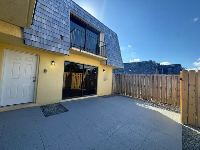 a view of a house with a garage