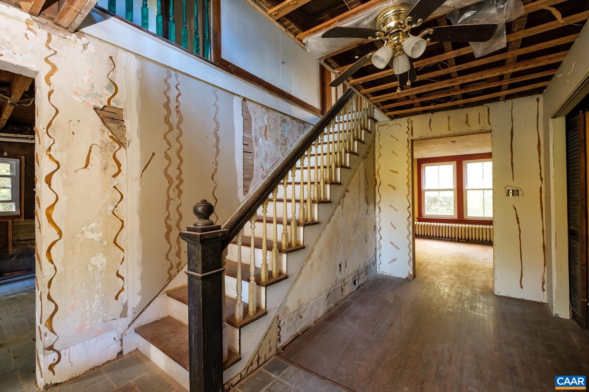 37 Pharsalia Road Roseland, VA 22967 - Photo 11 of 59 a view of entryway with wooden floor and stairs