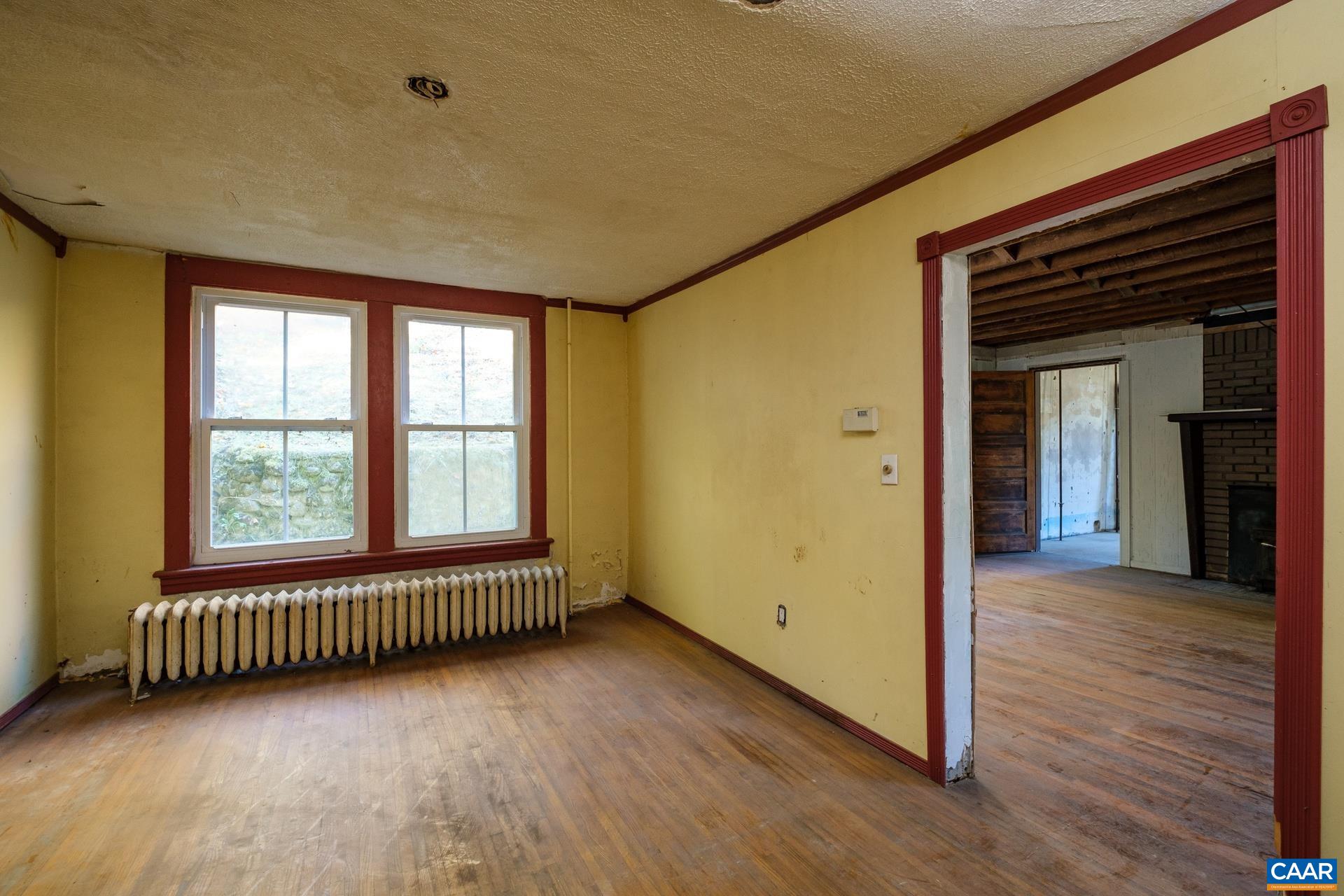 37 Pharsalia Road Roseland, VA 22967 - Photo 17 of 59 an empty room with wooden floor and windows