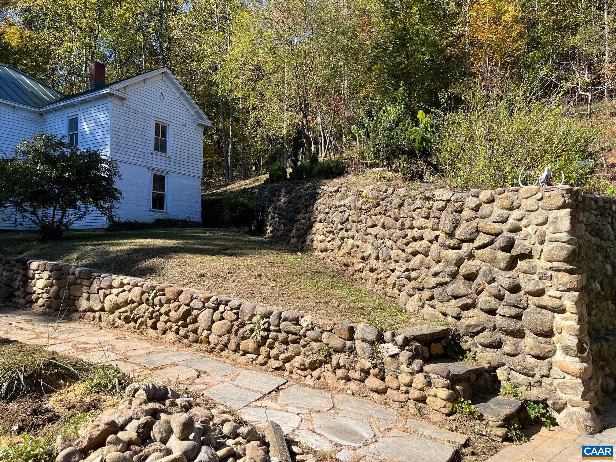 37 Pharsalia Road Roseland, VA 22967 - Photo 19 of 59 a front view of a house with a yard