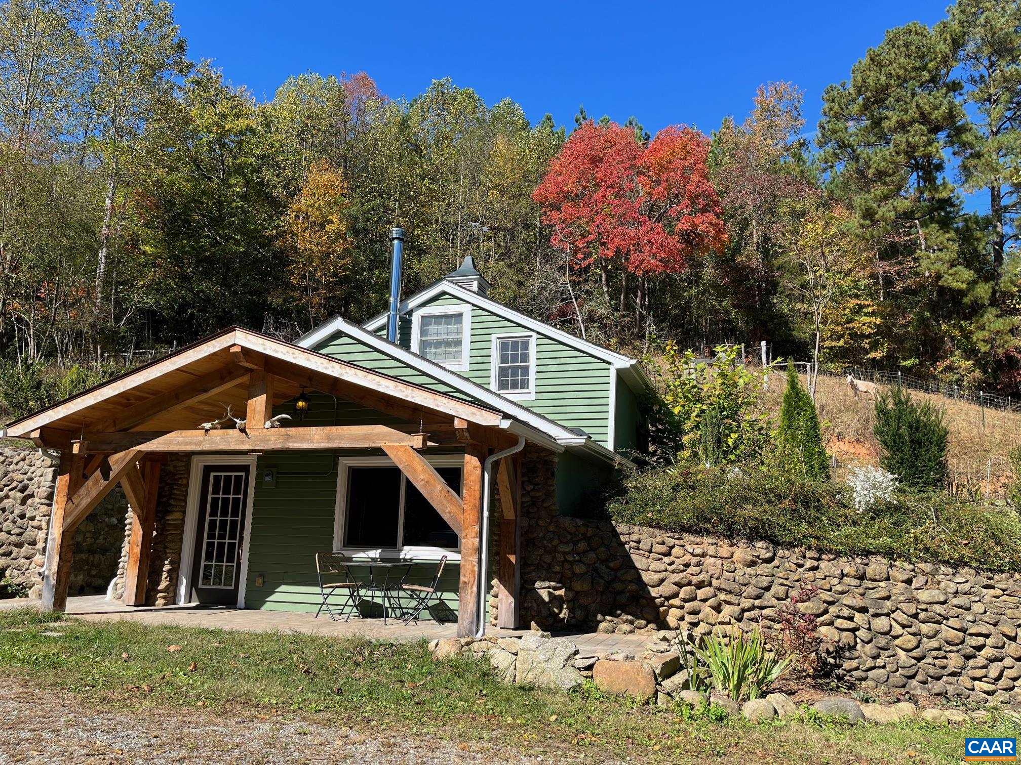 37 Pharsalia Road Roseland, VA 22967 - Photo 26 of 59 a front view of a house with a yard