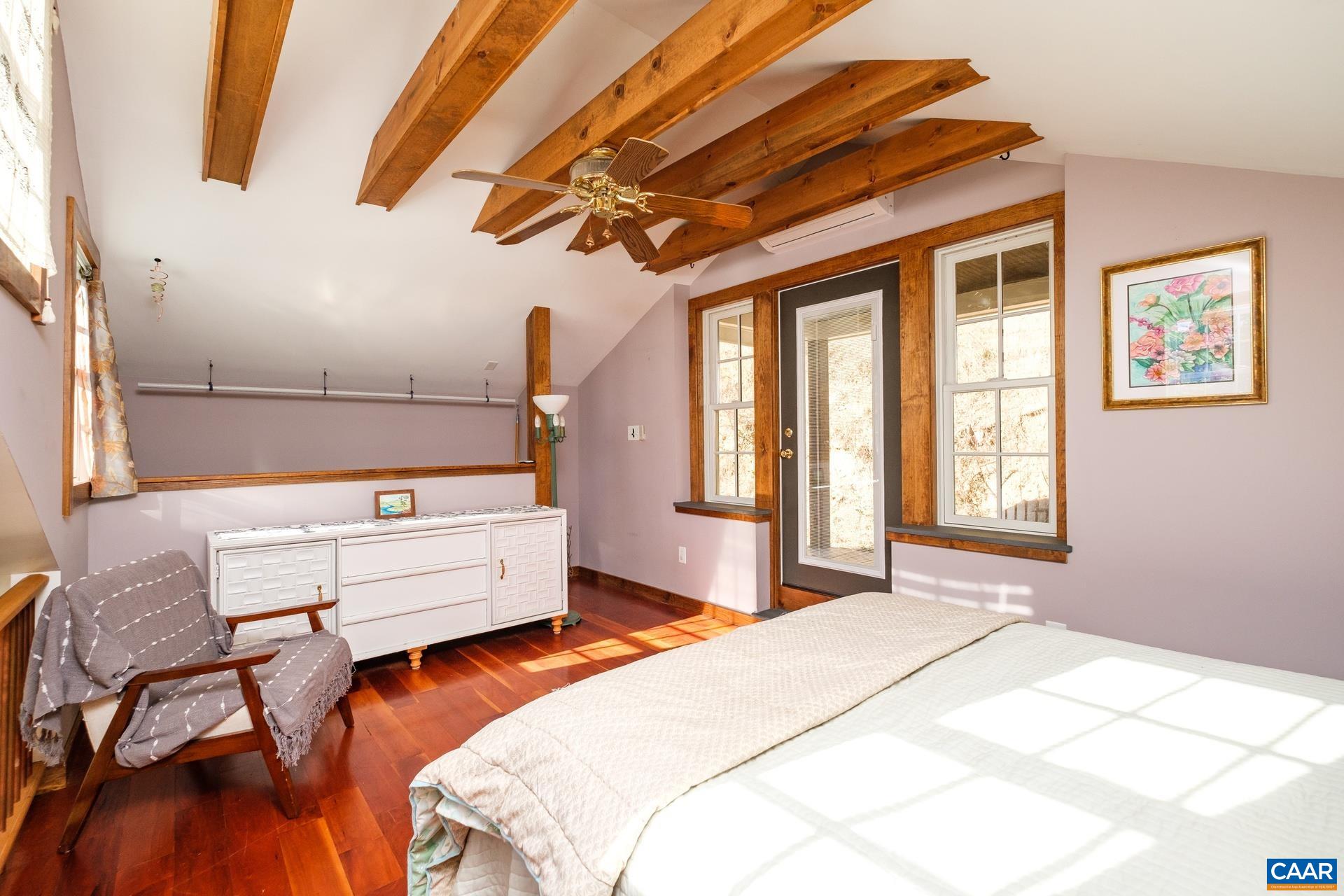 37 Pharsalia Road Roseland, VA 22967 - Photo 34 of 59 a bedroom with furniture and window