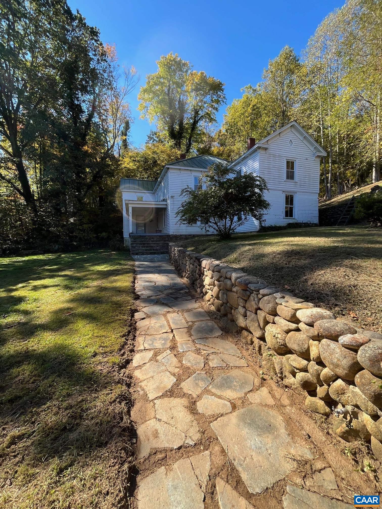 37 Pharsalia Road Roseland, VA 22967 - Photo 4 of 59 a front view of a house with a yard