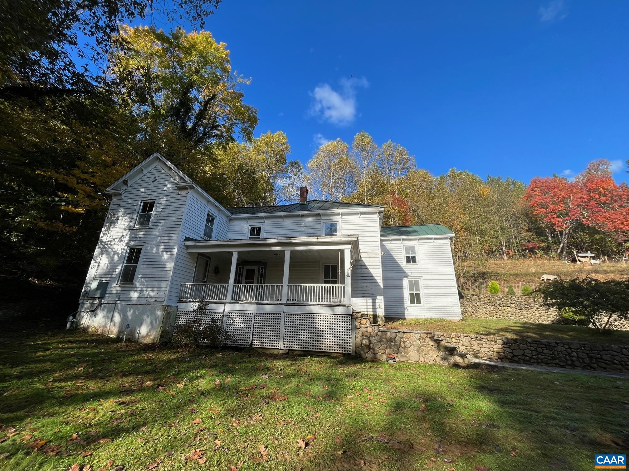 37 Pharsalia Road Roseland, VA 22967 - Photo 59 of 59 a front view of a house with a garden