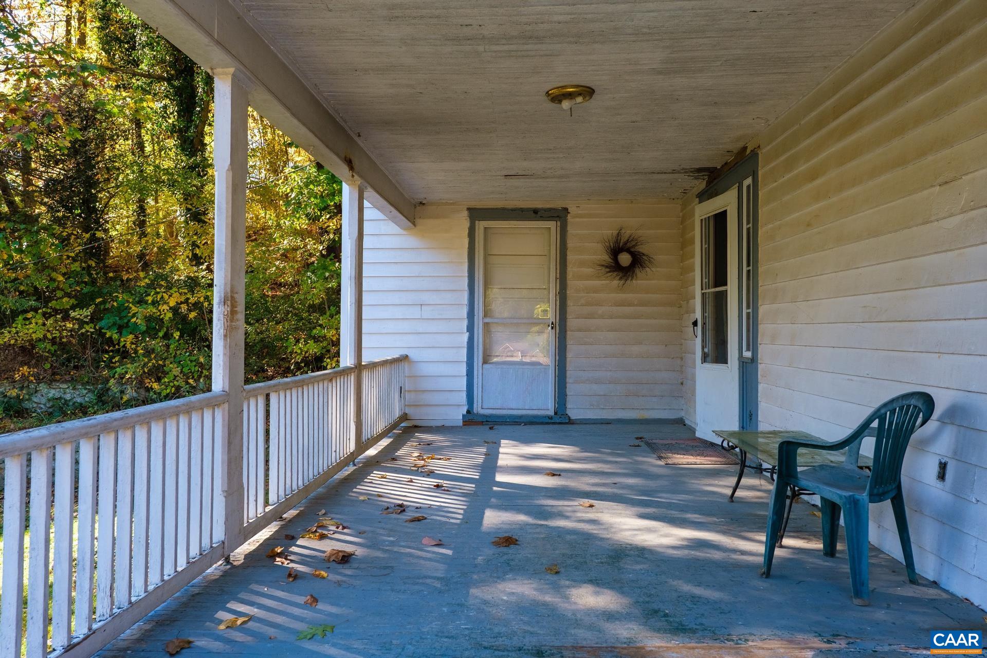 37 Pharsalia Road Roseland, VA 22967 - Photo 6 of 59 a view of a porch with wooden floor and outdoor space