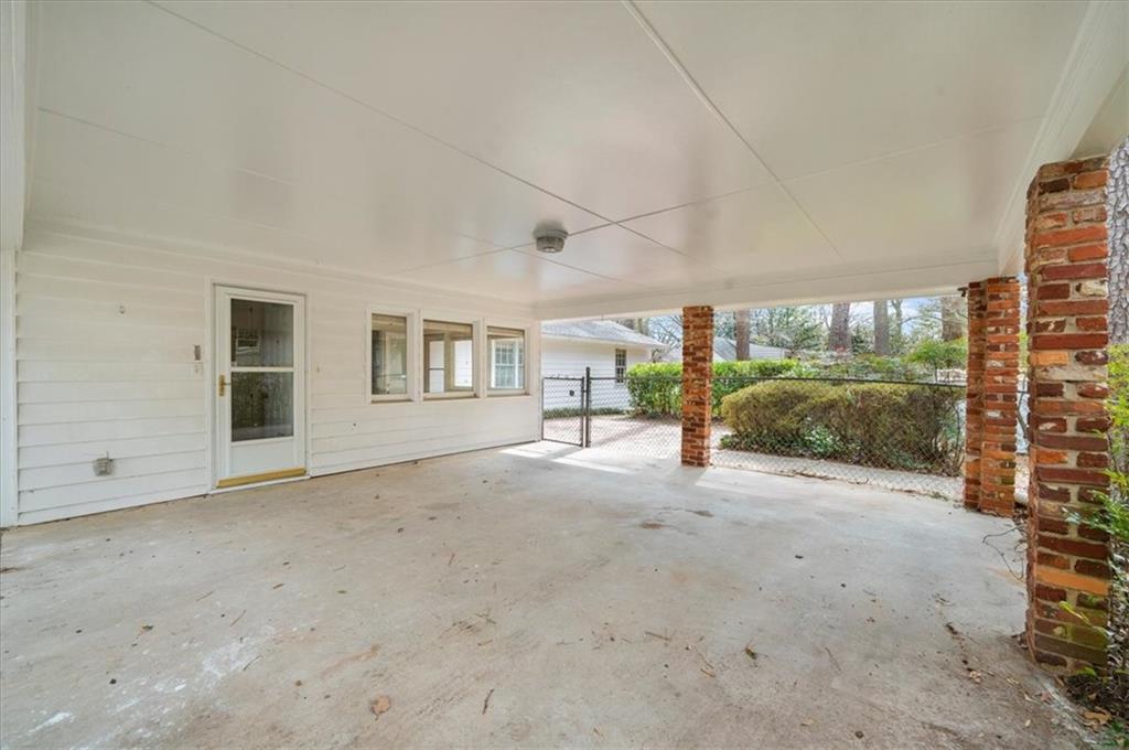 4890 High Point Road Northeast Sandy Springs, GA 30342 - Photo 30 of 35 a view of a house with a outdoor space