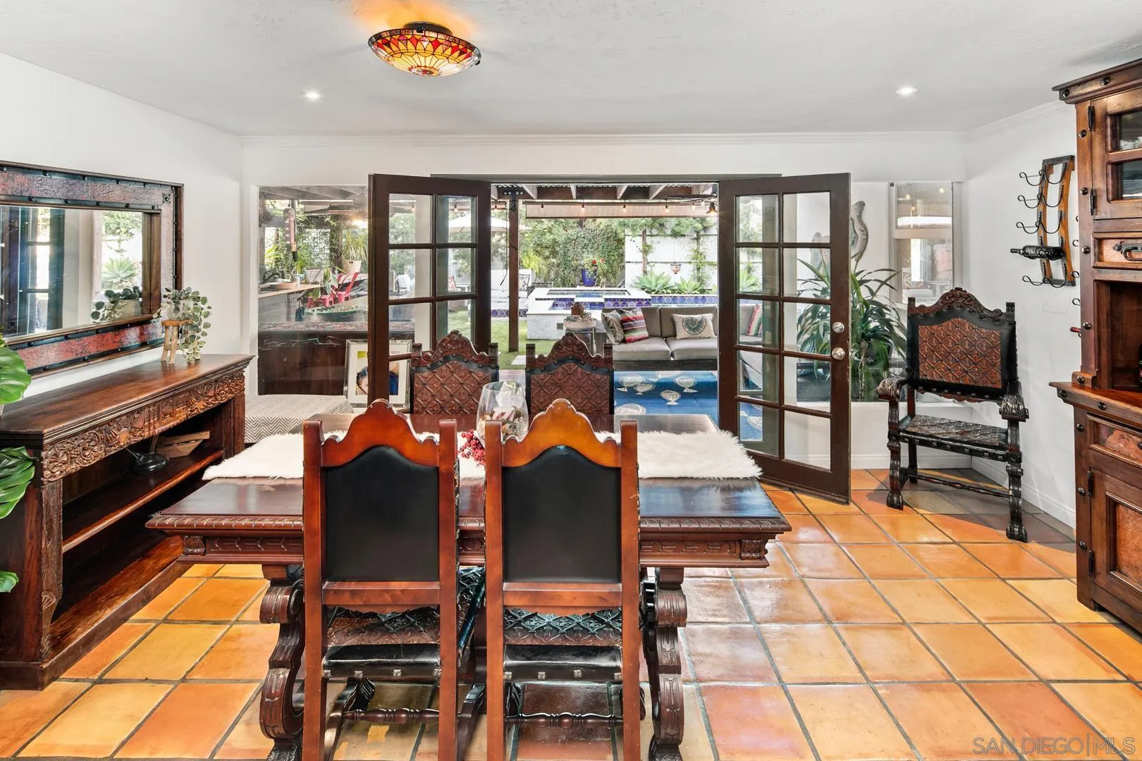 4195 Rochester Road San Diego, CA 92116 - Photo 22 of 39 a living room with furniture and a floor to ceiling window