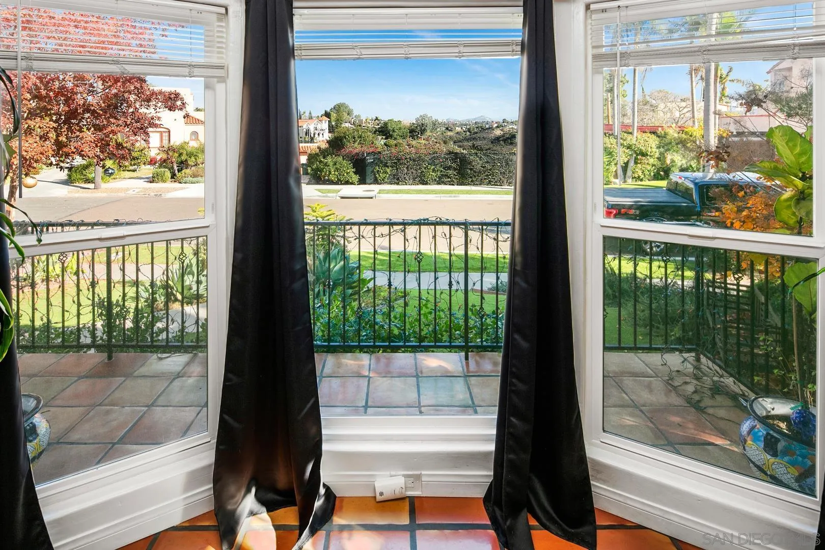 4195 Rochester Road San Diego, CA 92116 - Photo 29 of 39 a view of a glass door from a window