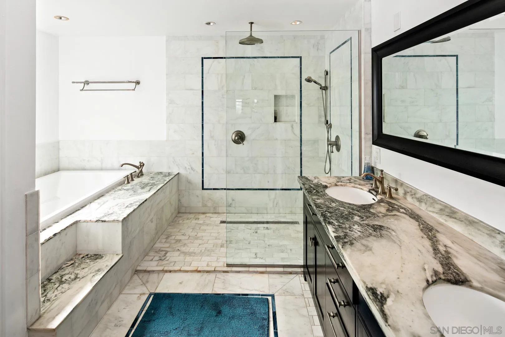 4195 Rochester Road San Diego, CA 92116 - Photo 30 of 39 a bathroom with a granite countertop sink a mirror and shower