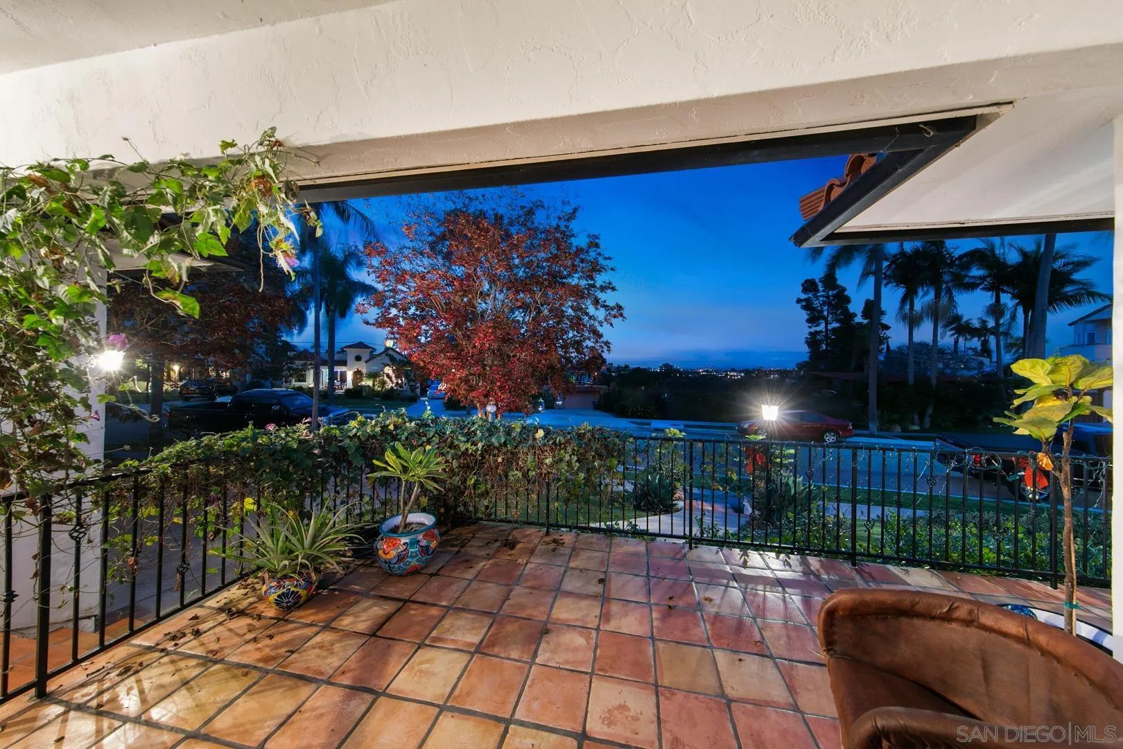 4195 Rochester Road San Diego, CA 92116 - Photo 3 of 39 a view of a chairs and a table in backyard