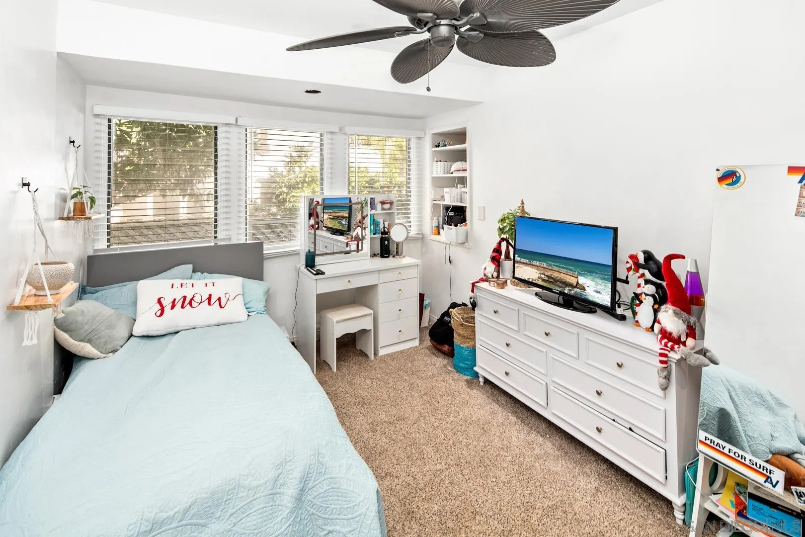 4195 Rochester Road San Diego, CA 92116 - Photo 31 of 39 a bedroom with a bed and a chandelier