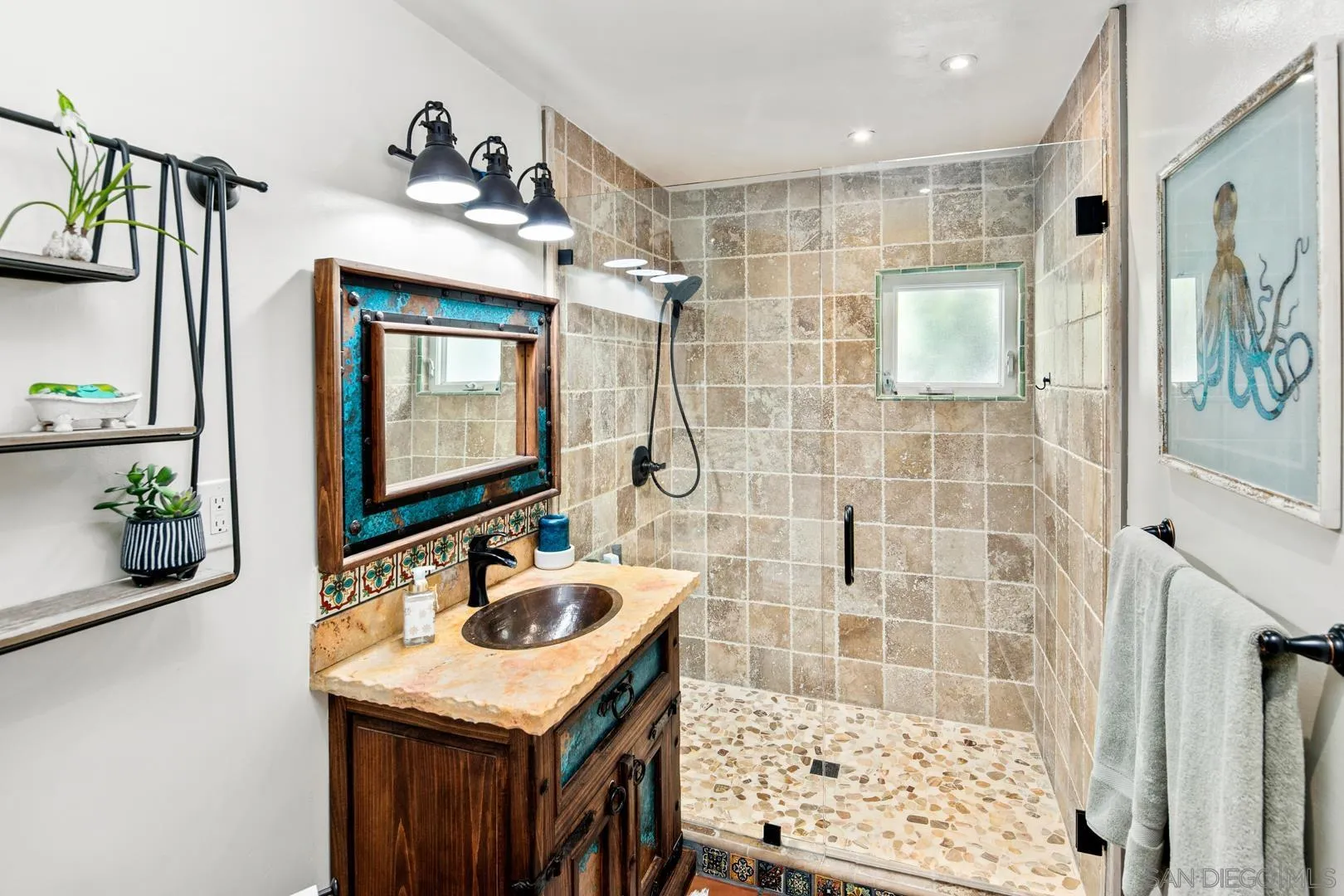 4195 Rochester Road San Diego, CA 92116 - Photo 33 of 39 a bathroom with a sink and a mirror