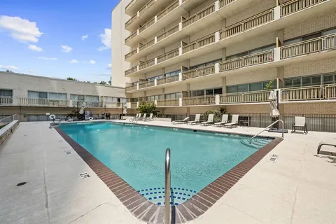 a view of a city with tall buildings