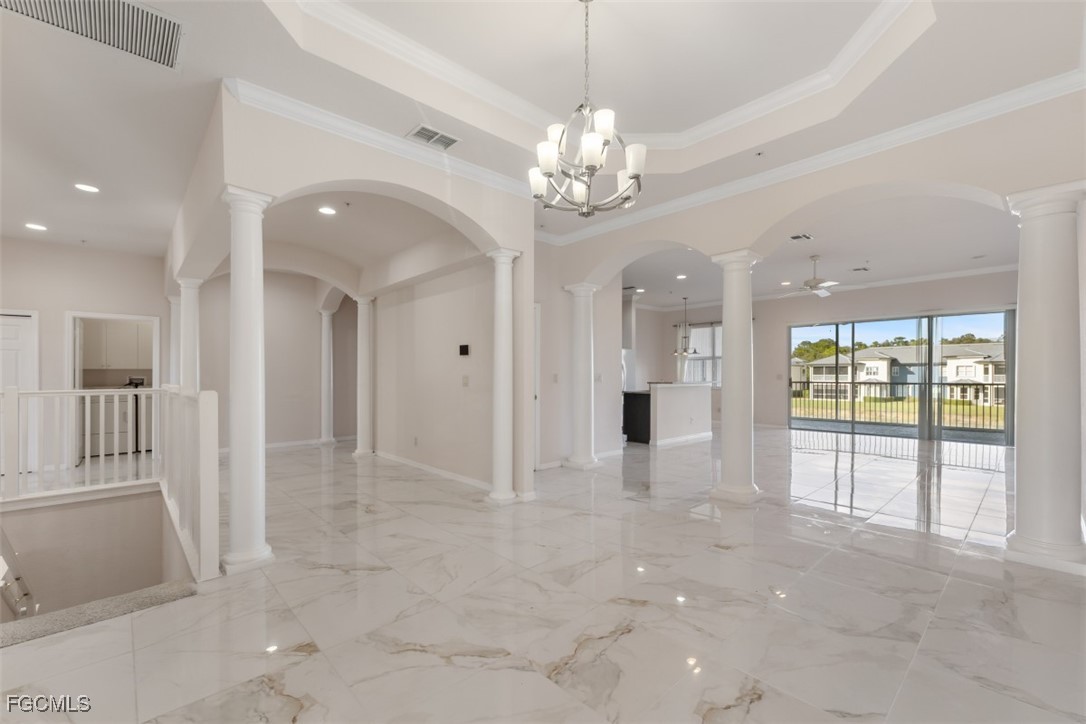 3520 Lansing Loop, Unit 203 Estero, FL 33928 - Photo 18 of 34 a view of an empty room with a fireplace