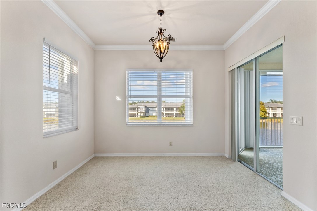 3520 Lansing Loop, Unit 203 Estero, FL 33928 - Photo 22 of 34 a view of an empty room with window