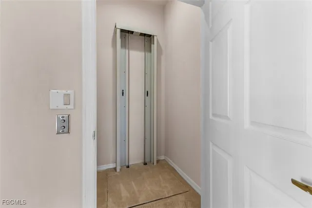 a view of a livingroom and an entryway