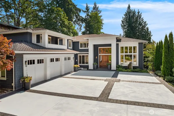 a front view of a house with yard