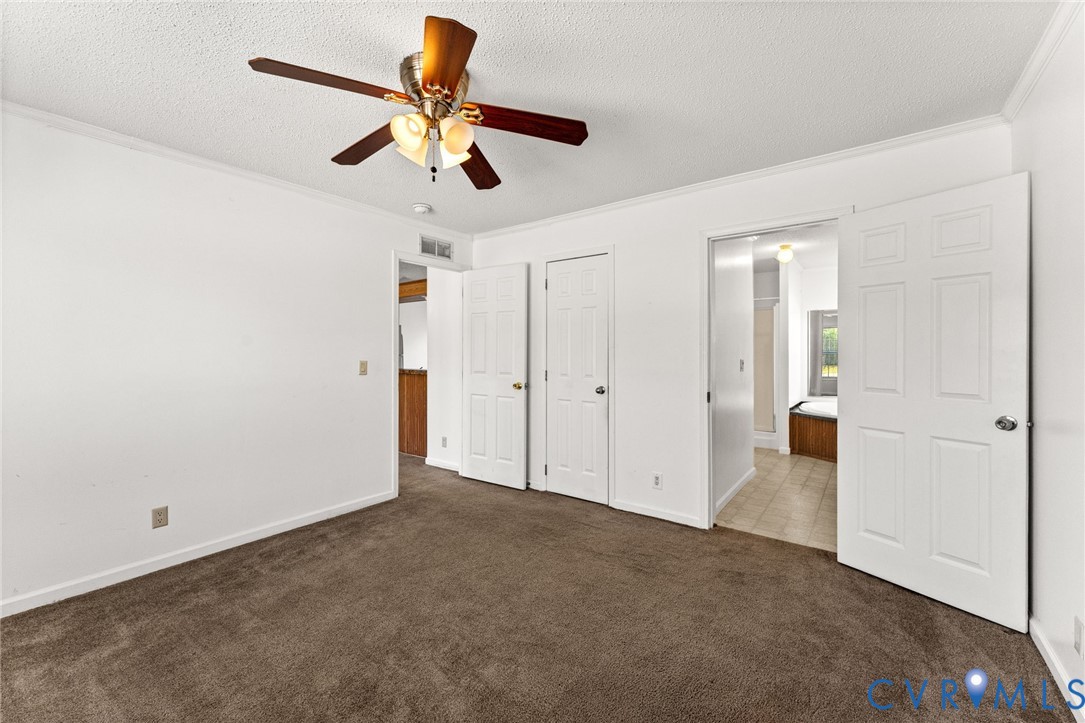 1450 Mt Prospect Road Laneview, VA 22504 - Photo 11 of 25 Another view of Primary Bedroom showing doorway to