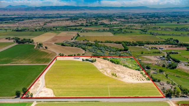 a view of an ocean and city