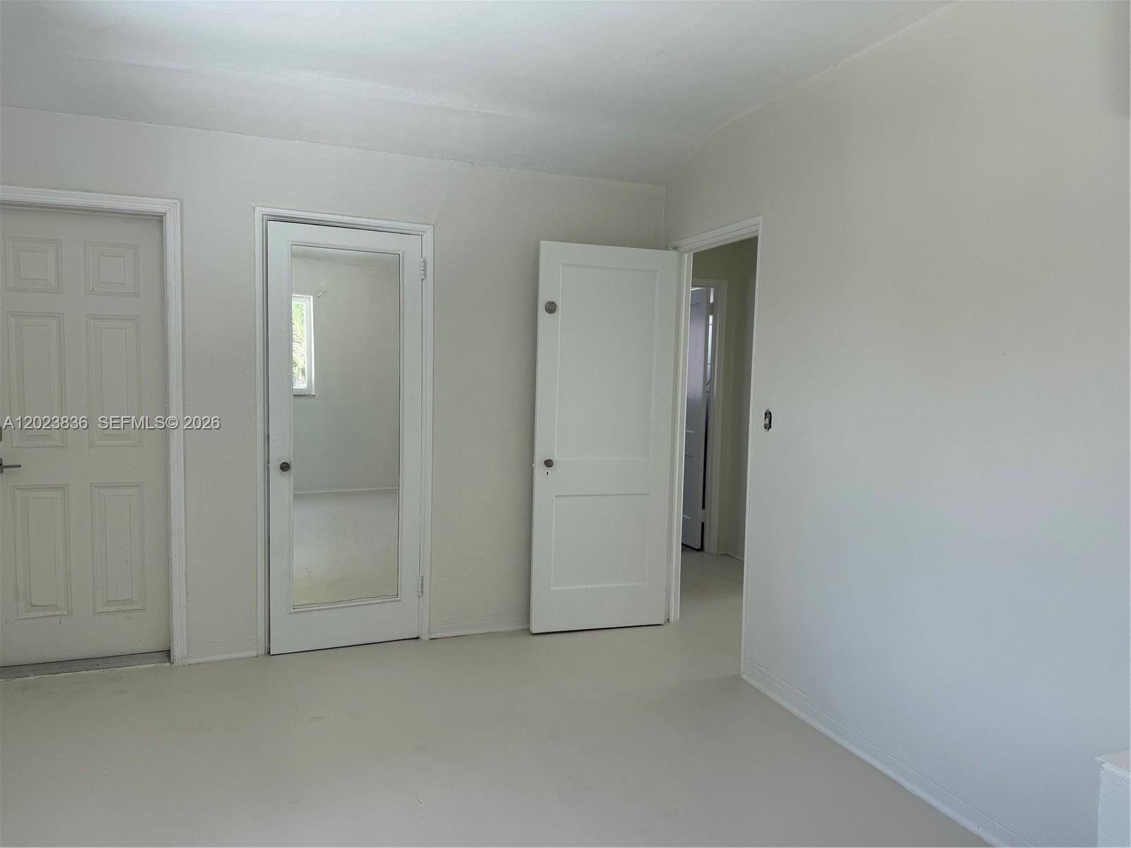 6312 Alton Road Miami Beach, FL 33140 - Photo 4 of 15 a view of an empty room