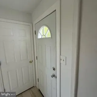 a view of a livingroom with wooden floor