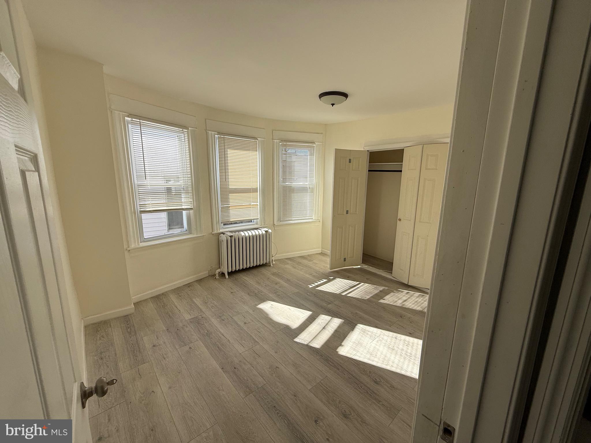 216 South 7th Street Darby, PA 19023 - Photo 36 of 46 a view of an empty room and window