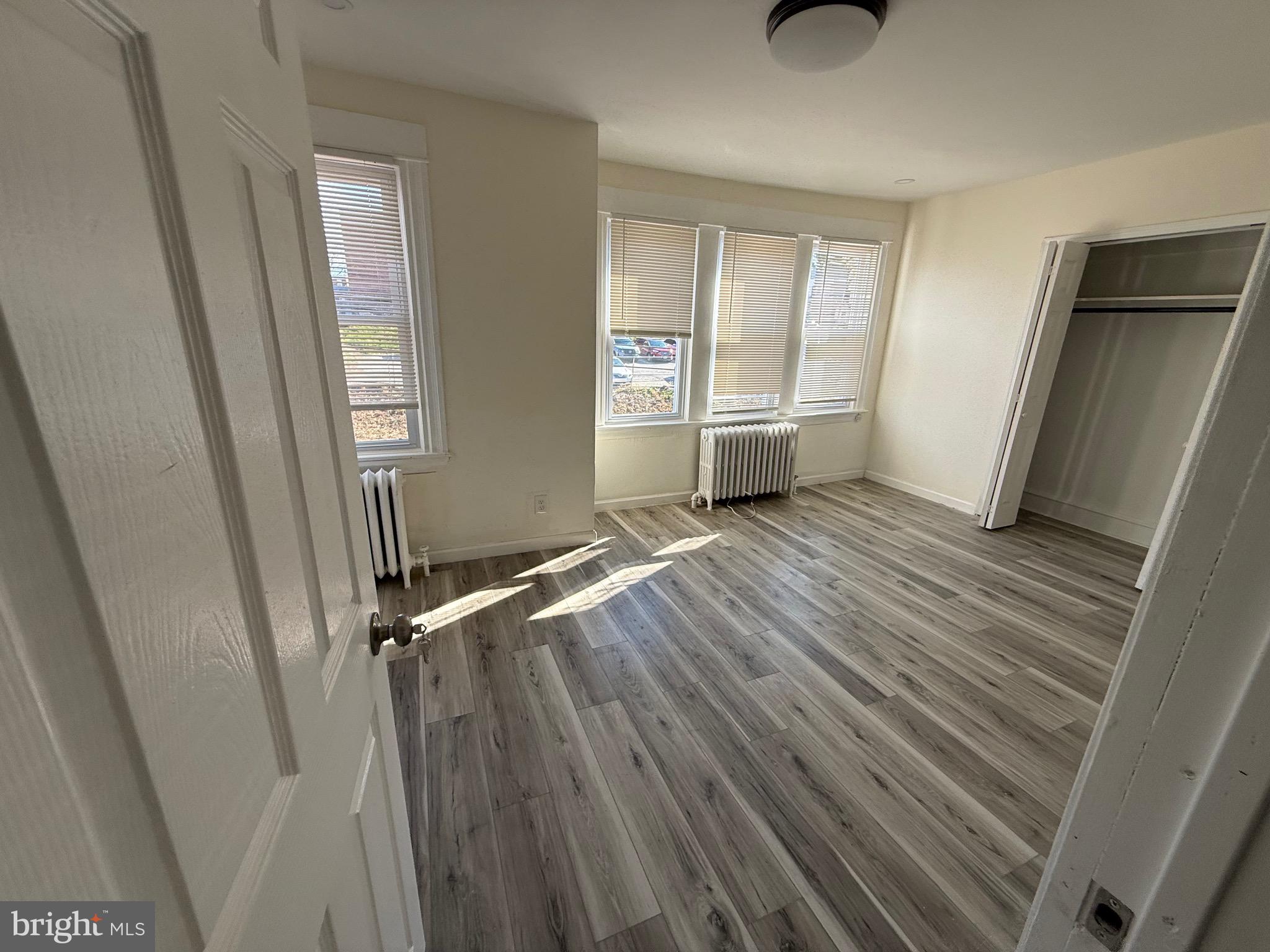 216 South 7th Street Darby, PA 19023 - Photo 39 of 46 a view of a room with wooden floor and window