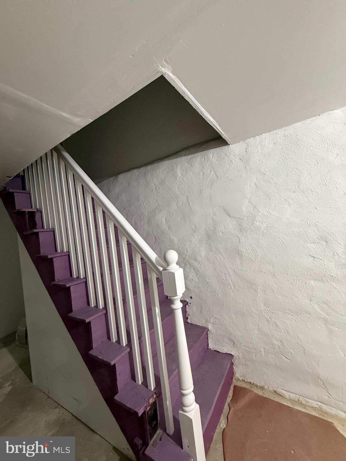 216 South 7th Street Darby, PA 19023 - Photo 40 of 46 a view of staircase with wooden floor and white walls