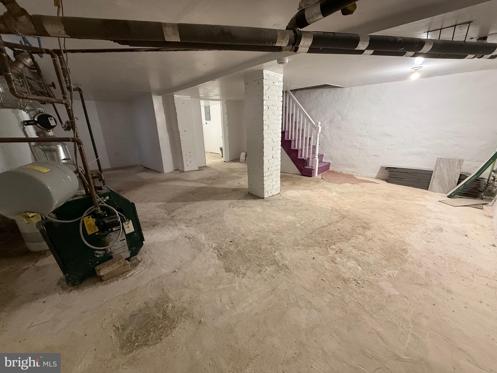 216 South 7th Street Darby, PA 19023 - Photo 42 of 46 a view of a garage with wooden floor