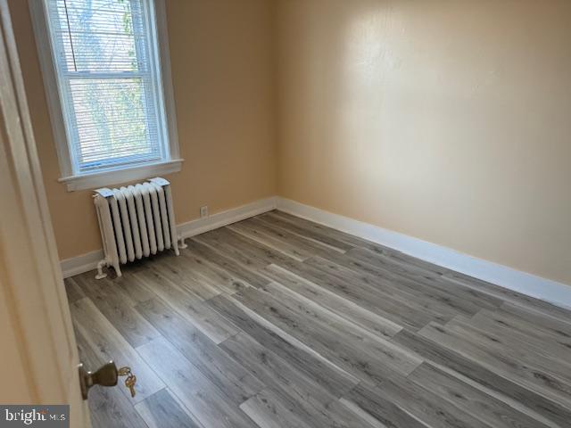 216 South 7th Street Darby, PA 19023 - Photo 7 of 46 an empty room with wooden floor