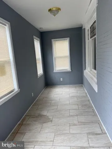 a bathroom with a shower toilet and sink