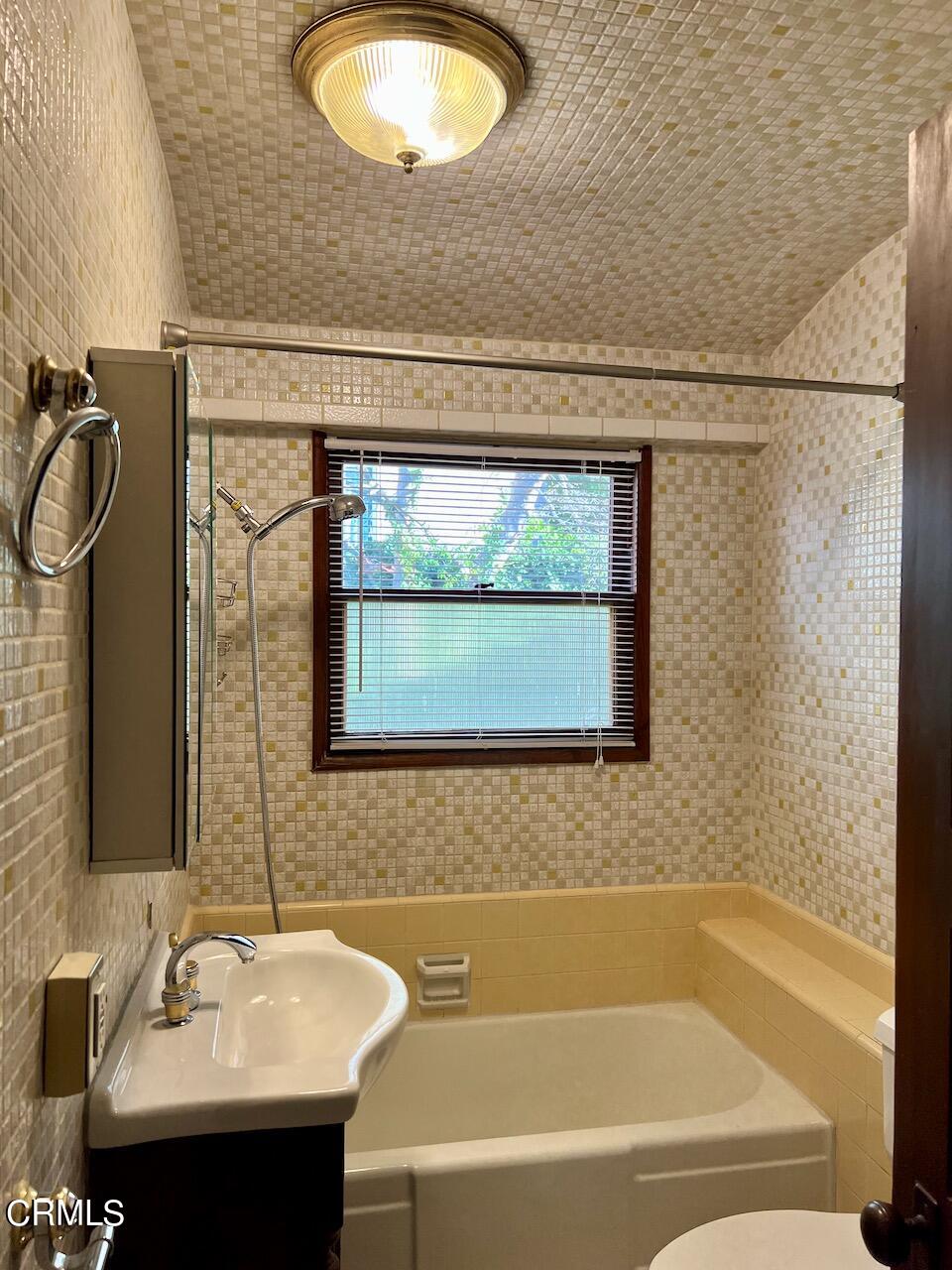 2435 Mohawk Street, Unit 6 Pasadena, CA 91107 - Photo 5 of 5 a bathroom with a sink and a bathtub