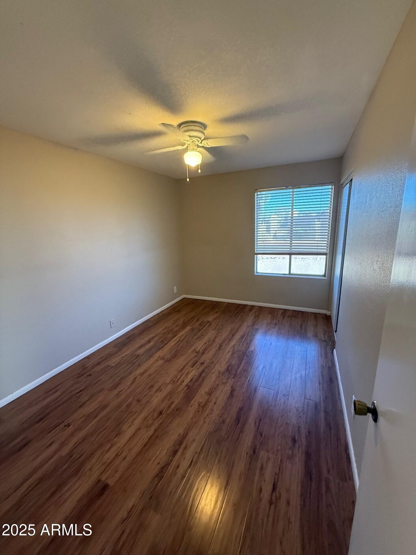 14806 Yerba Buena Way, Unit A Fountain Hills, AZ 85268 - Photo 14 of 16 wooden floor in an empty room
