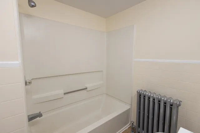 a bathroom with a bathtub