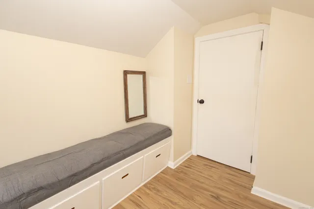 a hallway with wooden floor
