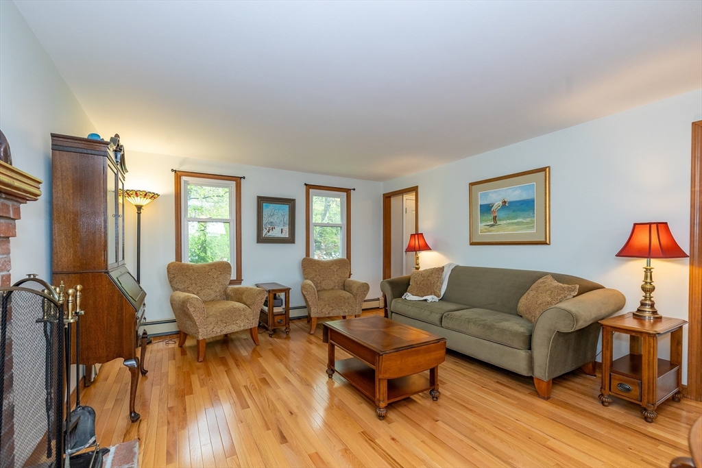 7 Adirondack Road Chelmsford, MA 01824 - Photo 12 of 31 a living room with furniture and a wooden floor